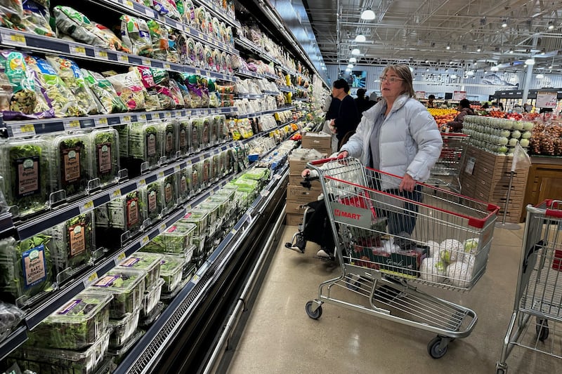 Shoppers shop at a grocery store in Schaumburg, Ill., Monday, Feb. 9, 2026. (AP Photo/Nam Y. Huh)