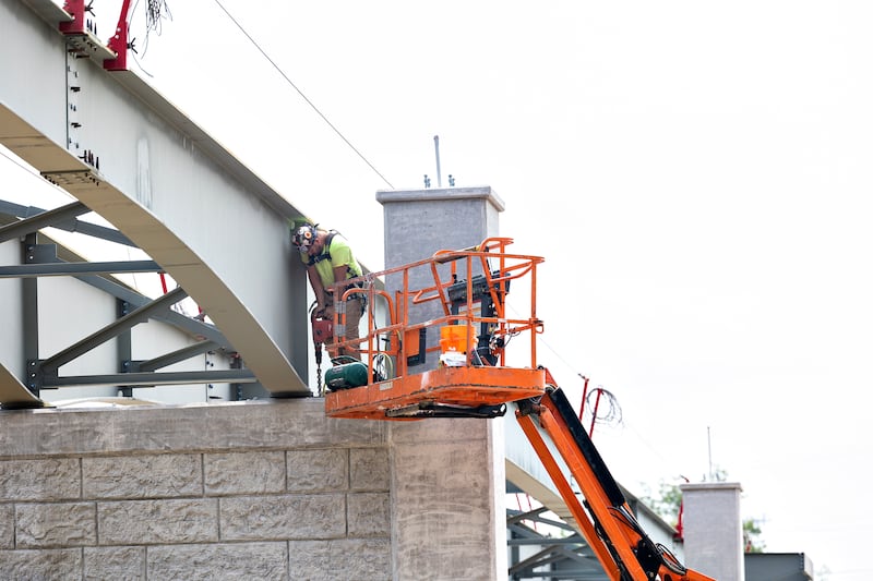 A worker drills into concrete Thursday, August 7, 2025, as progress is being made at Project Rock in Dixon.