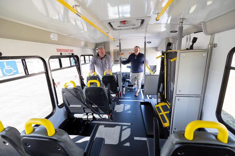 Reagan Mass Transit District Assistant Director Steve Davis (left) and Executive Director Greg Gates showcase one of the service’s new transport vehicles Friday, March 21, 2025, in Dixon. RMT took possession of six new vehicles earlier in the week which will replace six others that have aged out.