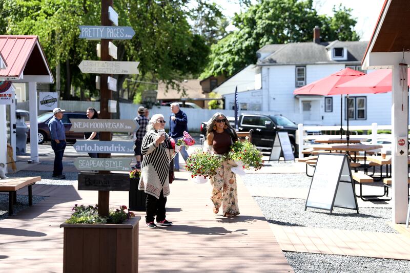The 2025 Batavia Boardwalk Shops opened on with a Ribbon Cutting Ceremony on Friday, May 9, 2025. The cluster of tiny shops on the southeast corner of Wilson and River Streets in Batavia houses 10 independent businesses as a business incubator project of Batavia MainStreet and the City of Batavia.
