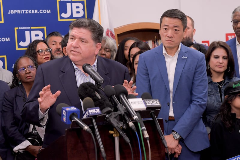 Texas House Democrats join Illinois Governor JB Pritzker speaks about the Texas Republican plans to redraw the House map during a press conference at the Democratic Party of DuPage County office in Carol Stream, IL on Sunday, Aug. 3, 2025. (AP Photo/Mark Black)