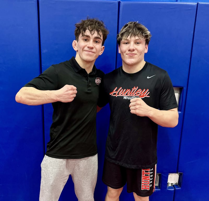 Huntley's Colin Huminsky and Alex Vega (left to right) each recorded victories for the Red Raiders during Friday's FVC dual against Dundee-Crown.