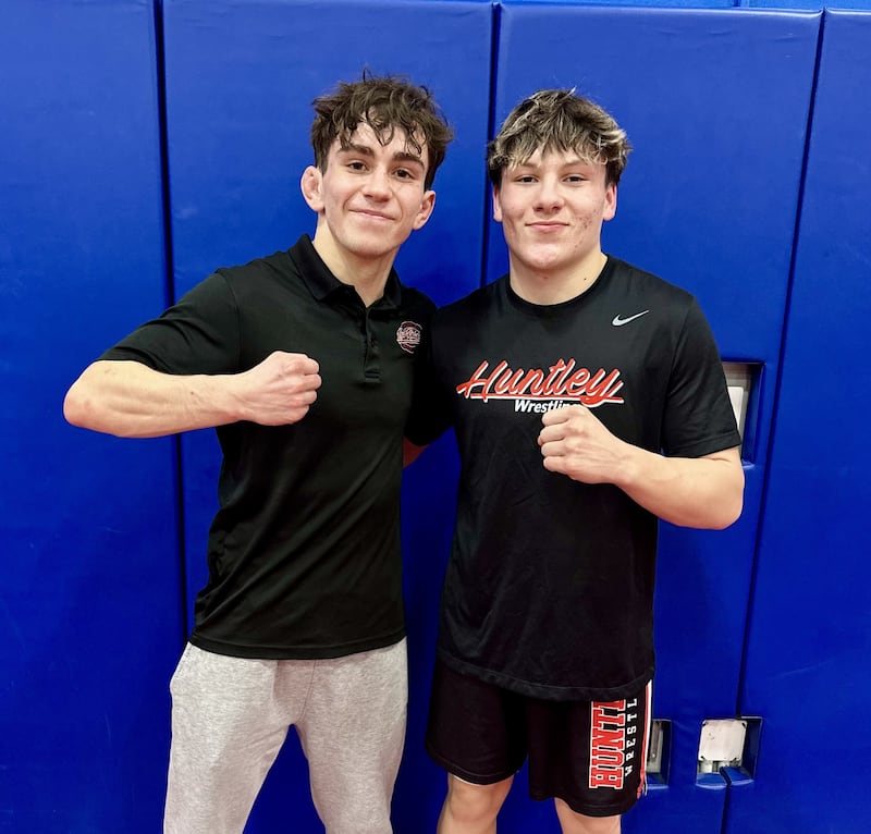 Huntley's Colin Huminsky and Alex Vega (left to right) each recorded victories for the Red Raiders during Friday's FVC dual against Dundee-Crown.