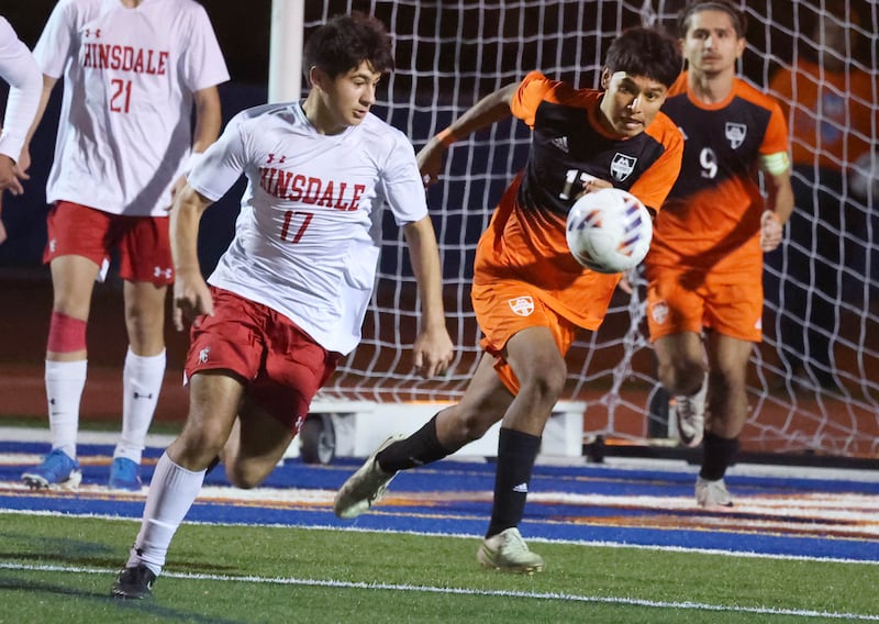 Hinsdale Central's Antonio Azzo and Hersey's Urik Contla go after the ball Friday, Nov. 8, 2024, during their Class 3A state semifinal game at Hoffman Estates High School.