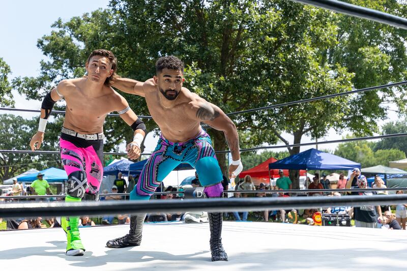 (left to right) Jordan Kross gets irish whipped into rope by Stephen Wolf at the Taste of the Illinois Valley DreamWave Wrestling event on Saturday, August 2, 2025 at Centennial Park in Peru.