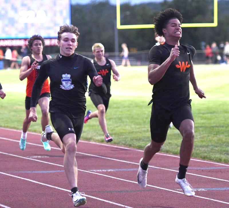 Hinckley-Big Rock's Alex Casanas (left) crosses the finish line in second behind Winnebago's Mason Smith in the 200 meters at the 1A Oregon Sectional on Friday, May 22, 2026.