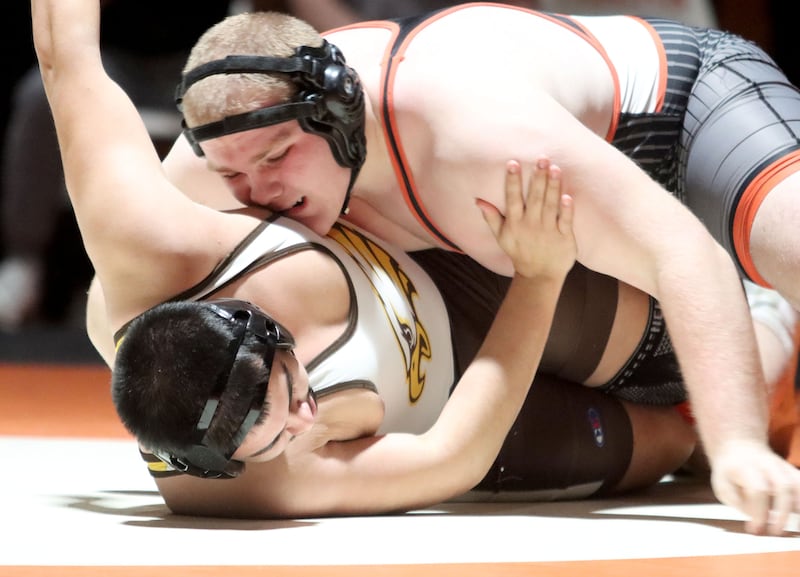 Crystal Lake Central’s Logan Gough battles Jacobs’ Javier Ramirez at 285 pounds in varsity boys wrestling on Tuesday, Jan. 20, 2026 at Crystal Lake Central High School in Crystal Lake.