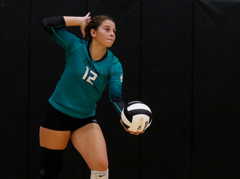 \Woodstock North's Gabriella Schefke serves the ball during a Kishwaukee River Conference volleyball match against Johnsburg on Wednesday, Sept. 4, 2024, at Woodstock North High School.