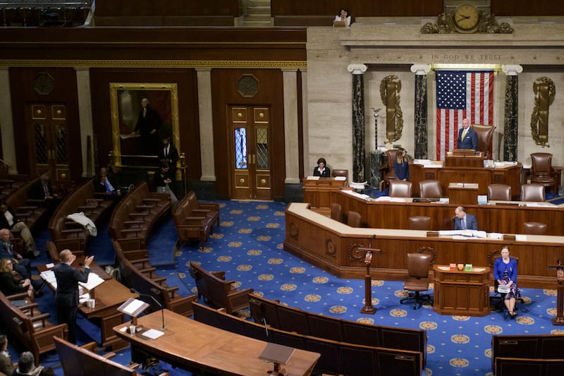 House Minority Leader Hakeem Jeffries, D-N.Y., left, speaks in the House chamber prior to the final vote for President Donald Trump's signature bill of tax breaks and spending cuts, at the Capitol, Thursday, July 3, 2025, in Washington. (AP Photo/Rod Lamkey, Jr.)