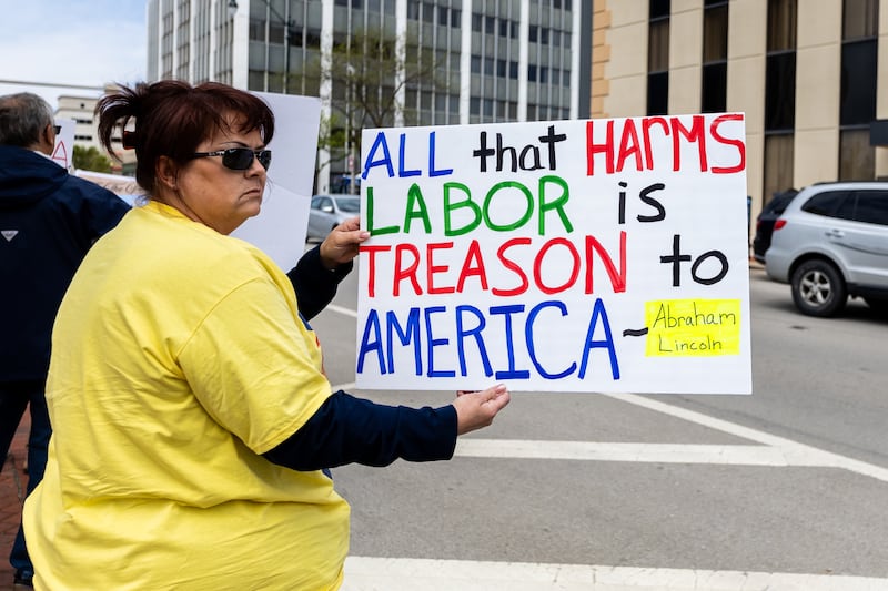 Janette Steinhilber, a member of Teamsters Local 179, supports strong unions during the May Day Weekend Rally in Downtown Joliet on May 3, 2025.