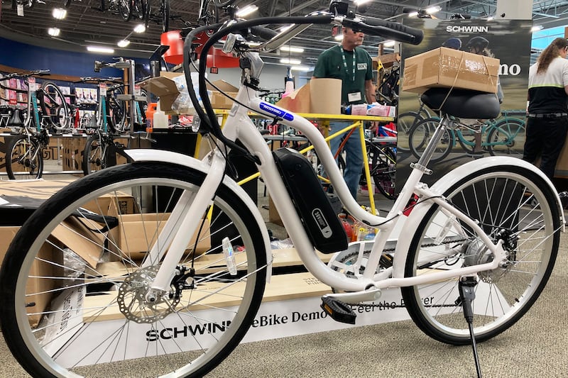 An e-bike is seen at a retail store in Glenview, Ill., Wednesday, July 20, 2022. (AP Photo/Nam Y. Huh)