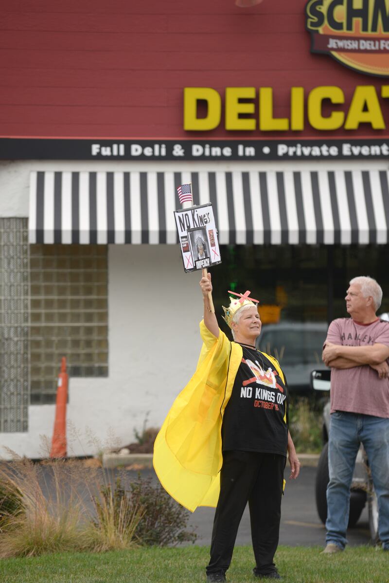 Karen Klauseger of Lemont  participates in the No Kings Day Rally in Lisle Saturday Oct 18, 2025. No Kings Day rallies took place throughout DuPage and Cook County.