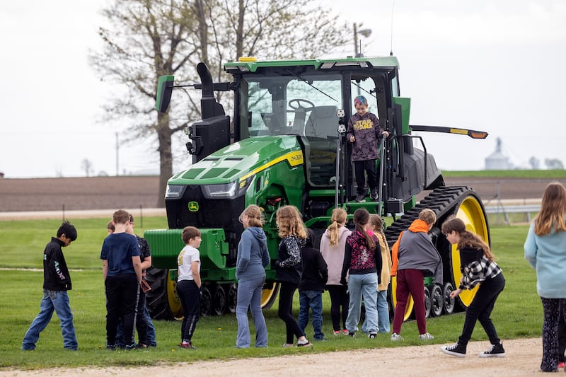 Fifth graders check out a tractor Friday, April 25, 2025, during Ag Expo at the Lee County 4H Fairgrounds.