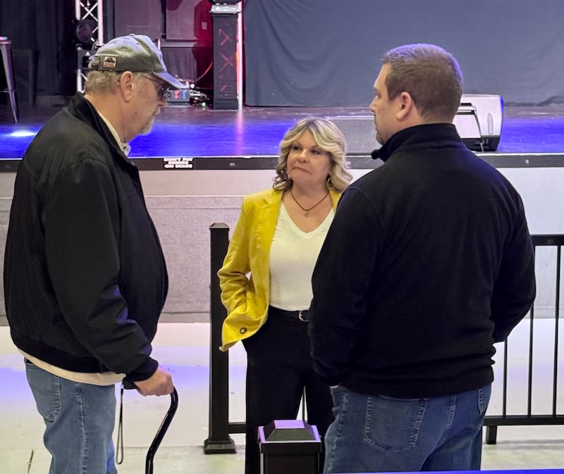 Bobbi Baehne, center, chats with Rich Eisle and Nick Eisle at the March 20, 2025, candidate meet-and-greet at The Vixen in McHenry. If Baehne's 20-vote lead for the 1st Ward seat continues, she plans to lobby for McHenry City Council term limits.