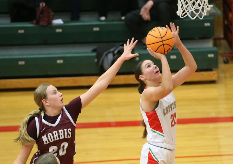 L-P's Brianna Ruppert eyes the hoop as Morris's Landrie Callahan defends on Friday, Dec. 6, 2024 in Sellett Gymnasium at L-P High School.