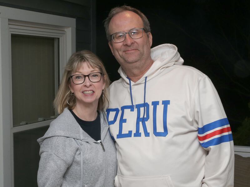 Michelle and Ken Kolowski pose for a photo during Election night on Tuesday, April 1, 2025 at their home in Peru.