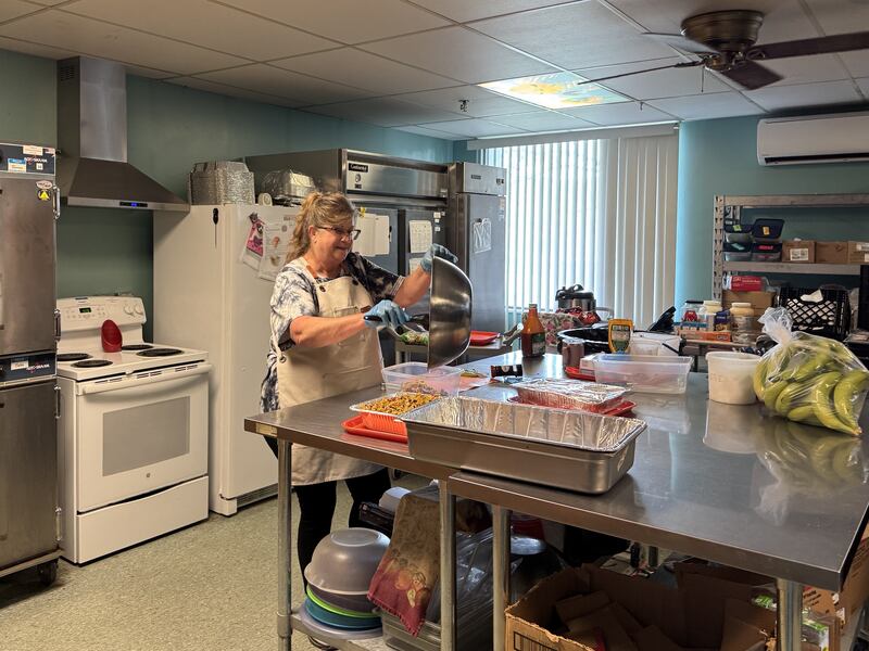 Mary Jo Mann works on cooking the meals that will be delivered to senior citizens on Thursday, May 8, 2025.
