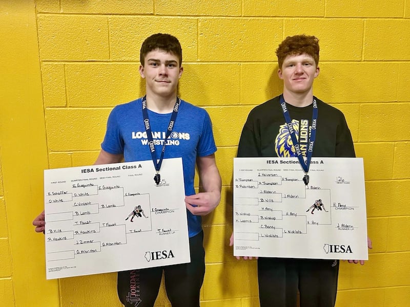 Princeton Logan's Eric Giaquinto (left) and Hawk Amy won IESA sectional championships at Riverdale to advance to this weekend's state wrestling tournament in DeKalb. Giaquinto won at 155 pounds, Amy at 126.