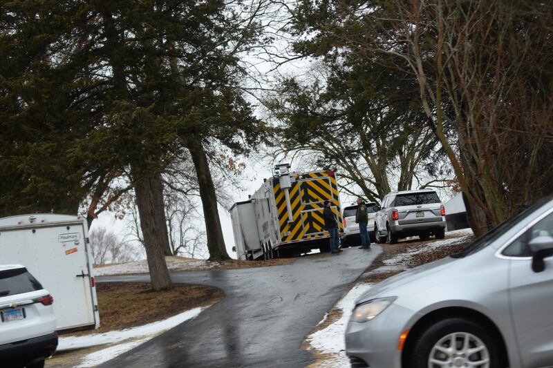Several law enforcement vehicles, including the Ogle County Sheriff Depatment's Mobile Command Center, were at a home at 4165 E. Illinois 64, about three miles east of Oregon, on Friday, March 7, 2025. Ogle County Sheriff Brian VanVickle said his office responded to the scene after receiving a report of deceased person.