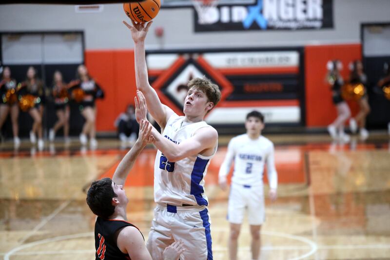 Geneva’s Hudson Kirby gets the ball in the hoop during a Class 4A St. Charles East Sectional semifinal against Wheaton Warrenville South on Wednesday, March 5, 2025 in St. Charles.