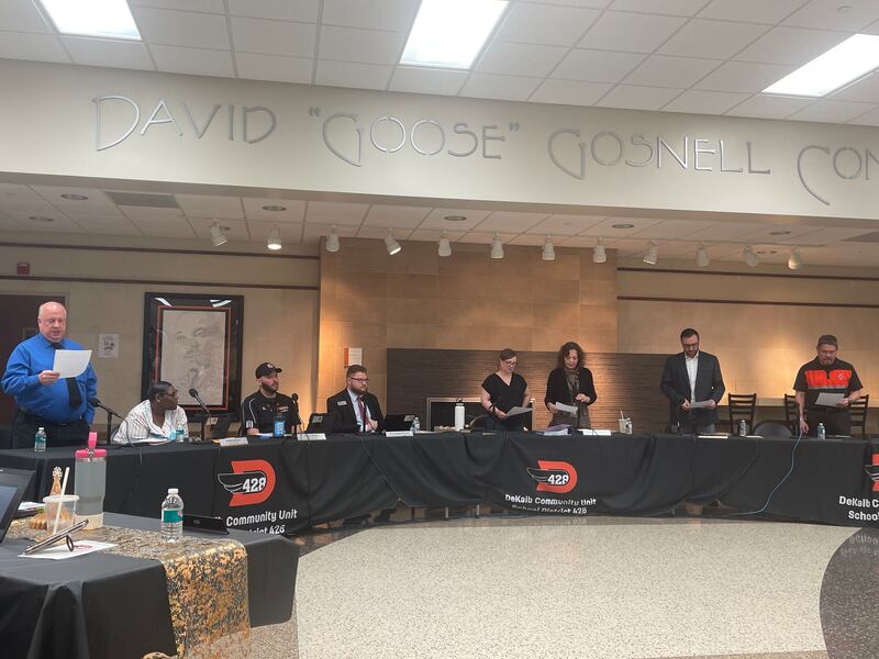 Four new board members take the oath of office May 6, 2025, during the DeKalb School Board meeting.