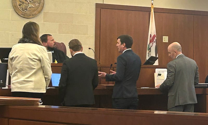 Ogle County Associate Judge Anthony Peska listens as attorneys Brad Thomson and Chris Carraway (center) speak for Jodie Wiederkehr (left) during a Feb. 4, 2026 hearing with Assistant Ogle County State's Attorney Matthew Leisten (right) at the Ogle County Judicial Center in Oregon.