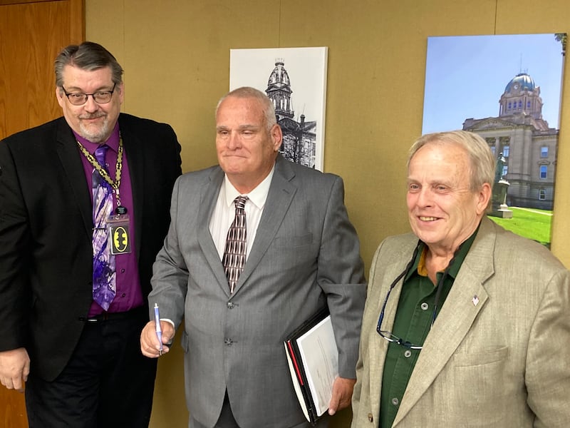 Kankakee County Clerk Dan Hendrickson, left, swore in Kenneth Lewellen, middle, and Roger Koerner Jr. to the County Board on Tuesday.