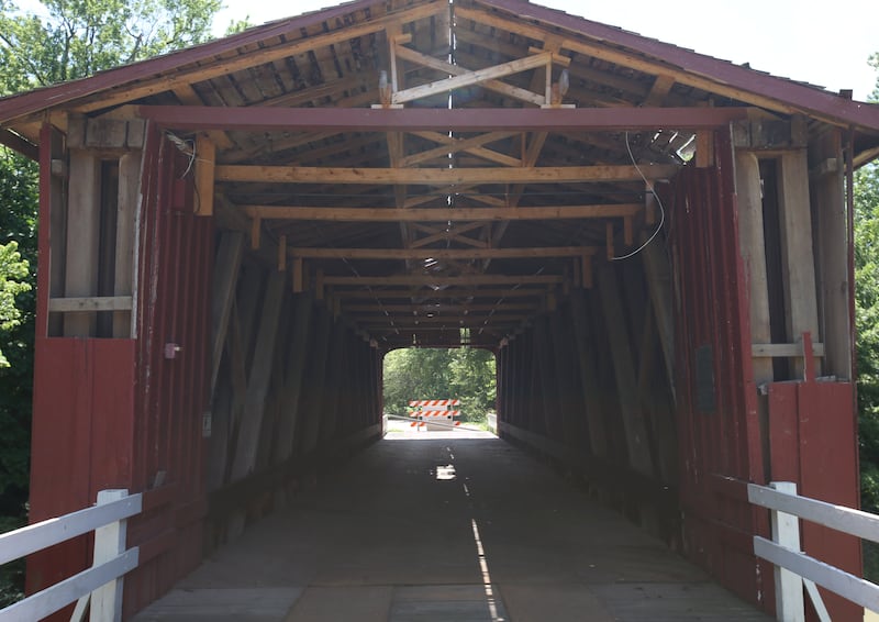 An interior view of the Red Covered Bridge on Monday, June 30, 2025 in Princeton. Last Friday, the Illinois Department of Transportation announced that the historic bridge enters next rehabilitation phase. Phase II includes the preparation of a detailed cost estimate and expected to take 12 to 18 months to complete and will result in advertising a repair contract to bidders. Approximately $1 million is identified to pay for the needed repairs in IDOT’s most recent multiyear program. A view of the Red Covered Bridge on Monday, June 30, 2025 in Princeton. Last Friday, the Illinois Department of Transportation announced that the historic bridge enters next rehabilitation phase. Phase II includes the preparation of a detailed cost estimate and expected to take 12 to 18 months to complete and will result in advertising a repair contract to bidders. Approximately $1 million is identified to pay for the needed repairs in IDOT’s most recent multiyear program. The bridge survived a number of threats, both intentional and unintentional, including arson, erosion and high winds. It also has survived several strikes by large trucks with it's most recent strike in 2023.