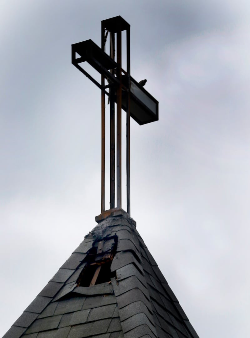 A hole in the steeple of the St. John’s Lutheran Church on Friday, July 11, 2025, after a fire overnight at the Hebron church.