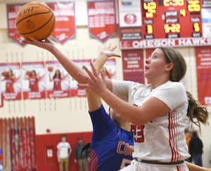 Photos: Oregon girls down Genoa-Kingston 48-32