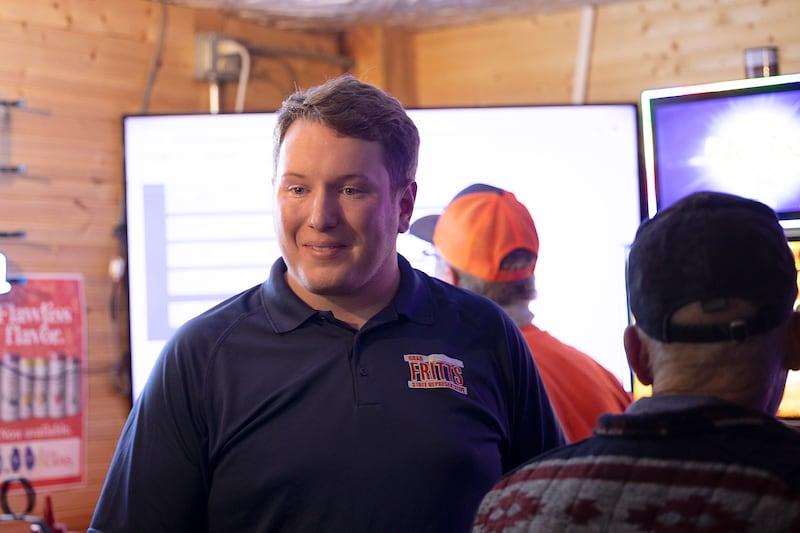Brad Fritts speaks with supporters Tuesday, Nov. 5, 2024, at the Shamrock in Dixon for his poll watching party.