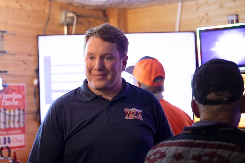 Brad Fritts speaks with supporters Tuesday, Nov. 5, 2024, at the Shamrock in Dixon for his poll watching party.