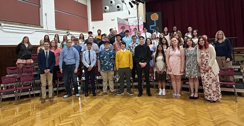The Oregon High School Choir poses for a photo before the start of their spring concert on Saturday, May 11, 2025. The Oregon Junior/Senior High School music department earned second place in the state for Class B schools in the 2024–2025 Illinois High School Association (IHSA) Music Sweepstakes.