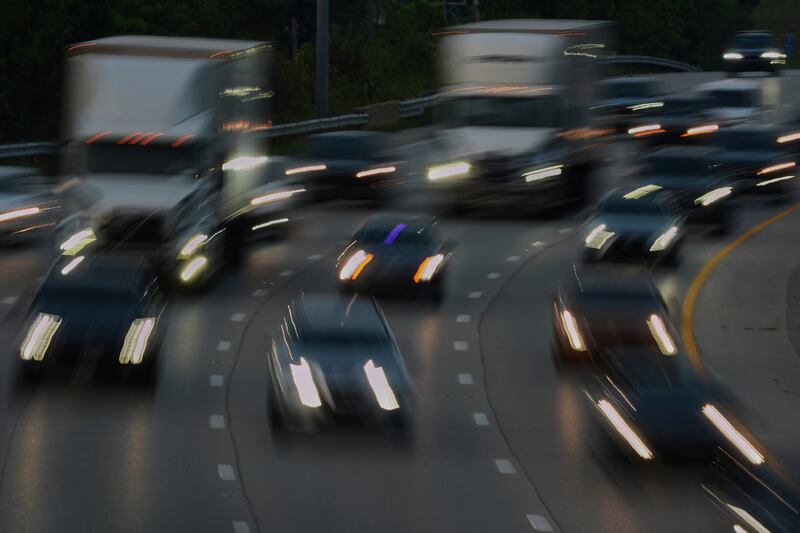FILE - Vehicles drive along a highway July 30, 2025, in Cincinnati. (AP Photo/Joshua A. Bickel, File)