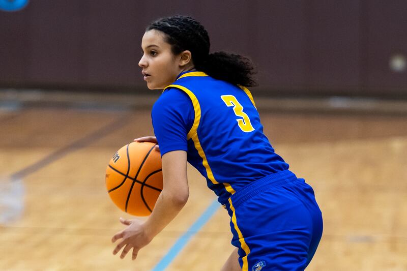 Joliet Central's Nevaeh Wright makes a nice move during a varsity girls basketball game against Joliet Catholic at Joliet Catholic on Jan. 5, 2026.