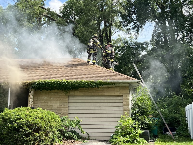 Joliet firefighters at the scene of a house fire in the 1200 block of Glenwood Avenue on Tuesday, June 9, 2026.