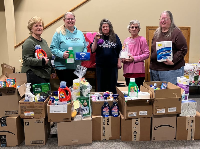 Picture taken at Lifeline left to right: Jenny Rodriguez presents a check to Kathy Drozd of Lifeline. Pictured from left to right: Earlyne Warmolts, Bubbles Casinger, Drozd from Lifeline, Marianne Jones and Connie Stauffer. Not pictured is Marsha Behrens.