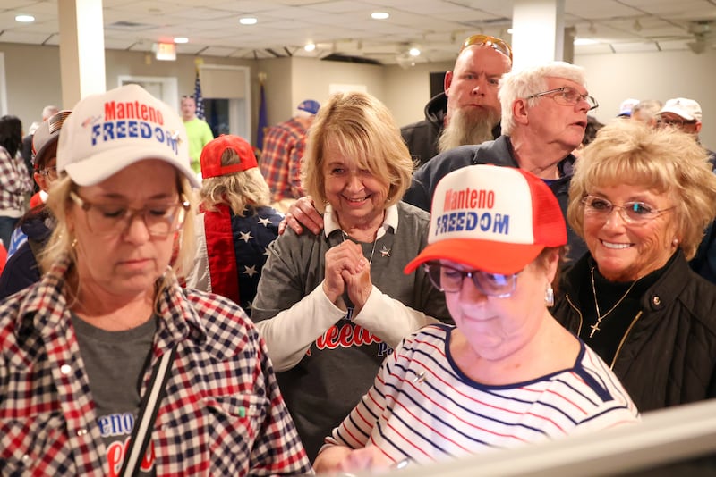 Manteno Mayor candidate Annette LaMore, center, watches as vote totals are calculated Tuesday night, April 1, 2025, at a watch party for the Freedom Party candidates at the Manteno American Legion. LaMore secured the seat over opponent Joel Gesky following local outrage over China-based battery plant Gotion putting roots down in the village.
