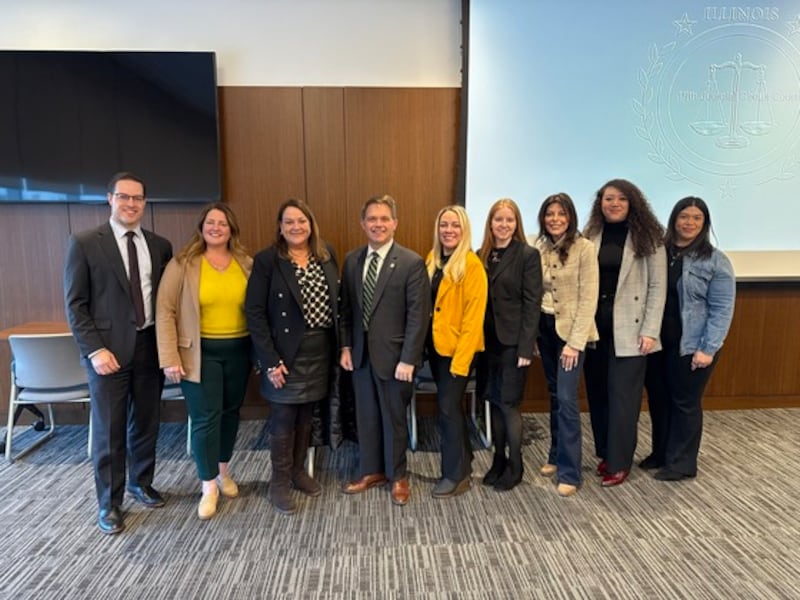 Russell Caskey (from left), Jane Anderson, Honorable Virginia M. Kendall, Eric Rinehart, Jenifer Couty, Kyle Doyle, Holly Kremin, Jessica Lomelin and Celina Morales.