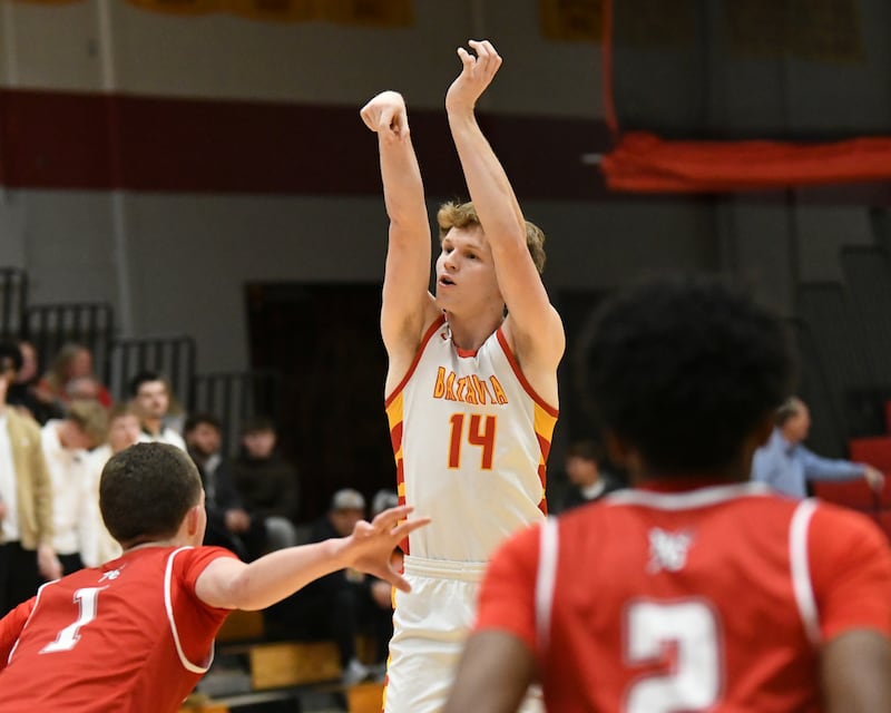 Batavia's Brett Berggren (14) takes a shot during the game against Hinsdale Central on Saturday Jan. 24, 2026, held at Batavia high School.