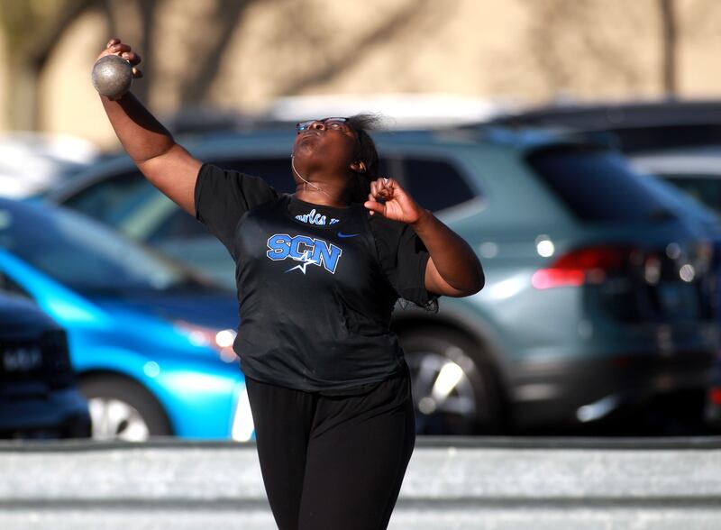 St. Charles North’s Tosin Oshin competes in the shot put during the DuKane Conference Girls Outdoor Championship on Thursday, May 8, 2025 at Glenbard North in Carol Stream.