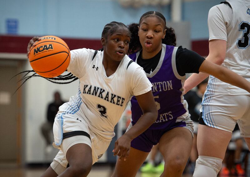 Kankakee's London Stroud controls the ball as Thornton's Cymone Maxey defends in a game on Thursday, December 4, 2025.