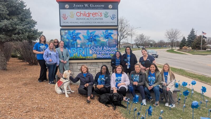 Approximately 15 people from the Will County Children’s Advocacy Center in Crest Hill and Guardian Angel Community Services in Joliet, planted blue pinwheels outside the center to raise awareness for child abuse and sexual assault on Tuesday, April 1, 2025.