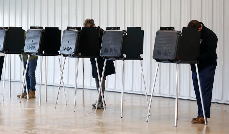 People vote at the DuPage County Fairgrounds polling site Tuesday, April 1, 2025 in Wheaton Ill.