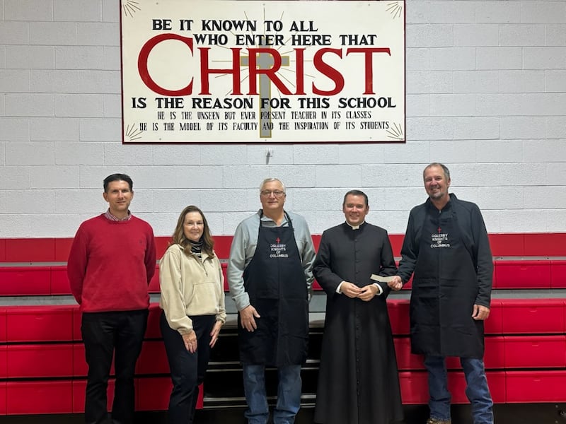 Oglesby Knights of Columbus recently donated $1,500 to the Academy of St. Carlo Acutis. From left are principal Nathan Boudreau, principal Deb Myers, KC treasurer Dan Gregorich, The Very Rev. Paul Carlson of Holy Family Church, and Grand Knight Tom Daley.
