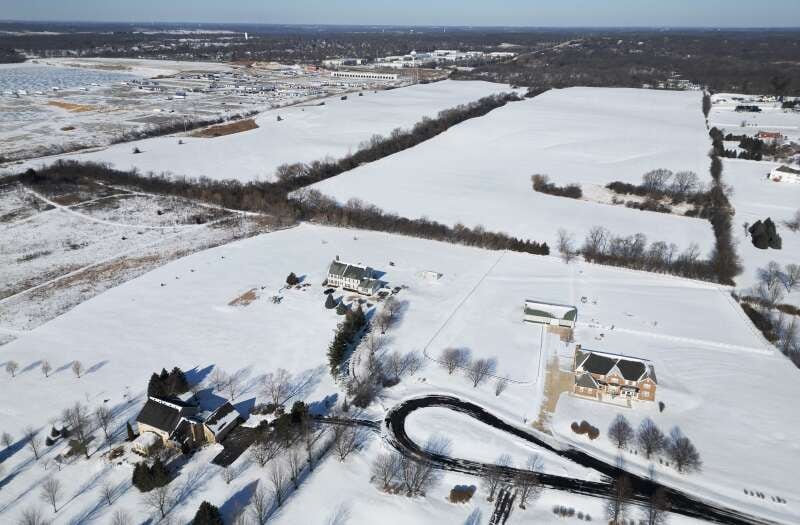 Homes stand south of land where a proposed data center in Barrington Hills was set to be located. The plan has been spiked following public outcry.