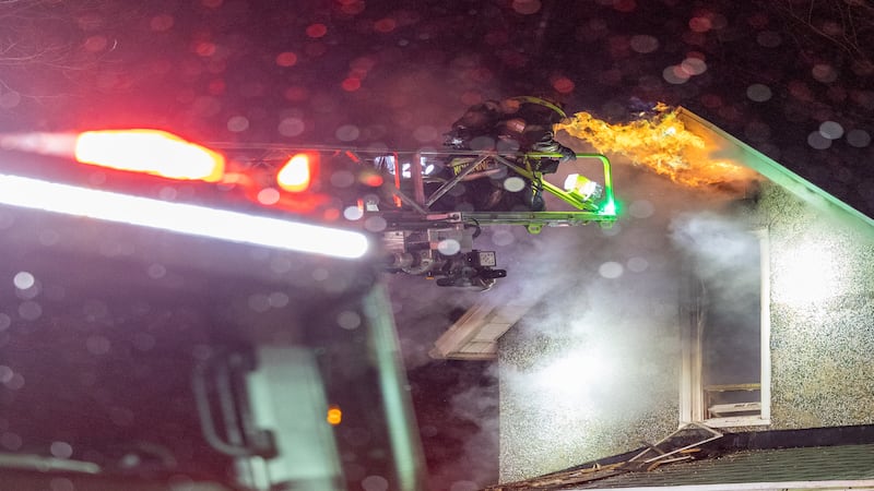 Photos: Firefighters battle house fire Saturday night in Spring Valley
