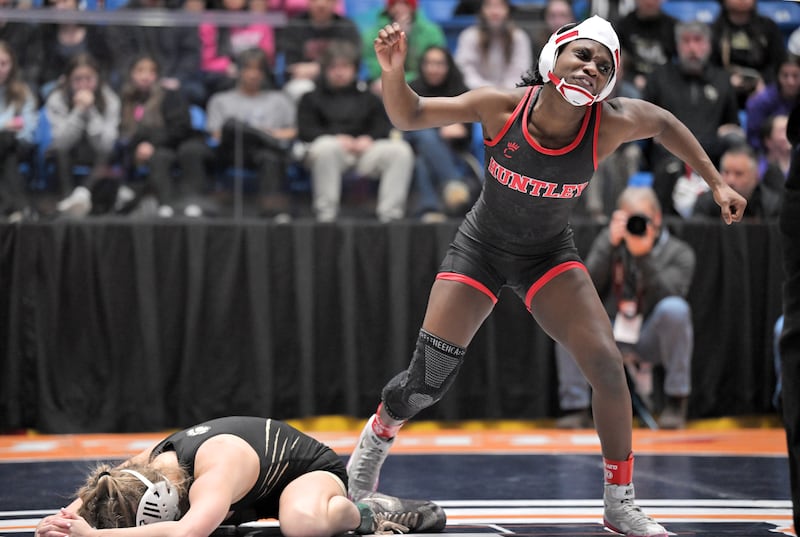 Huntley’s Janiah Slaughter reacts after defeating Oak Forest’s Alexandra Sebek in the 100-pound class at the girls wrestling state finals tournament at Grossinger Arena in Bloomington on Saturday, Feb. 28, 2026.