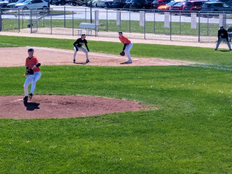 DeKalb starter Caden Smith delivers a pitch against Sycamore on Saturday, May 2, 2026.