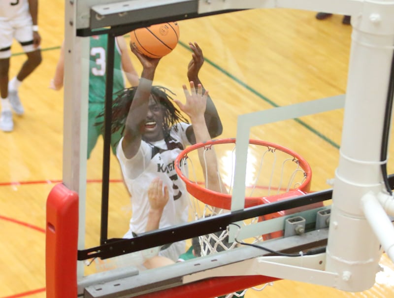 Kaneland's Fredrick Hassan lets go of a shot over L-P on Friday, Jan. 31, 2025 in Sellett Gymnasium at L-P High School.